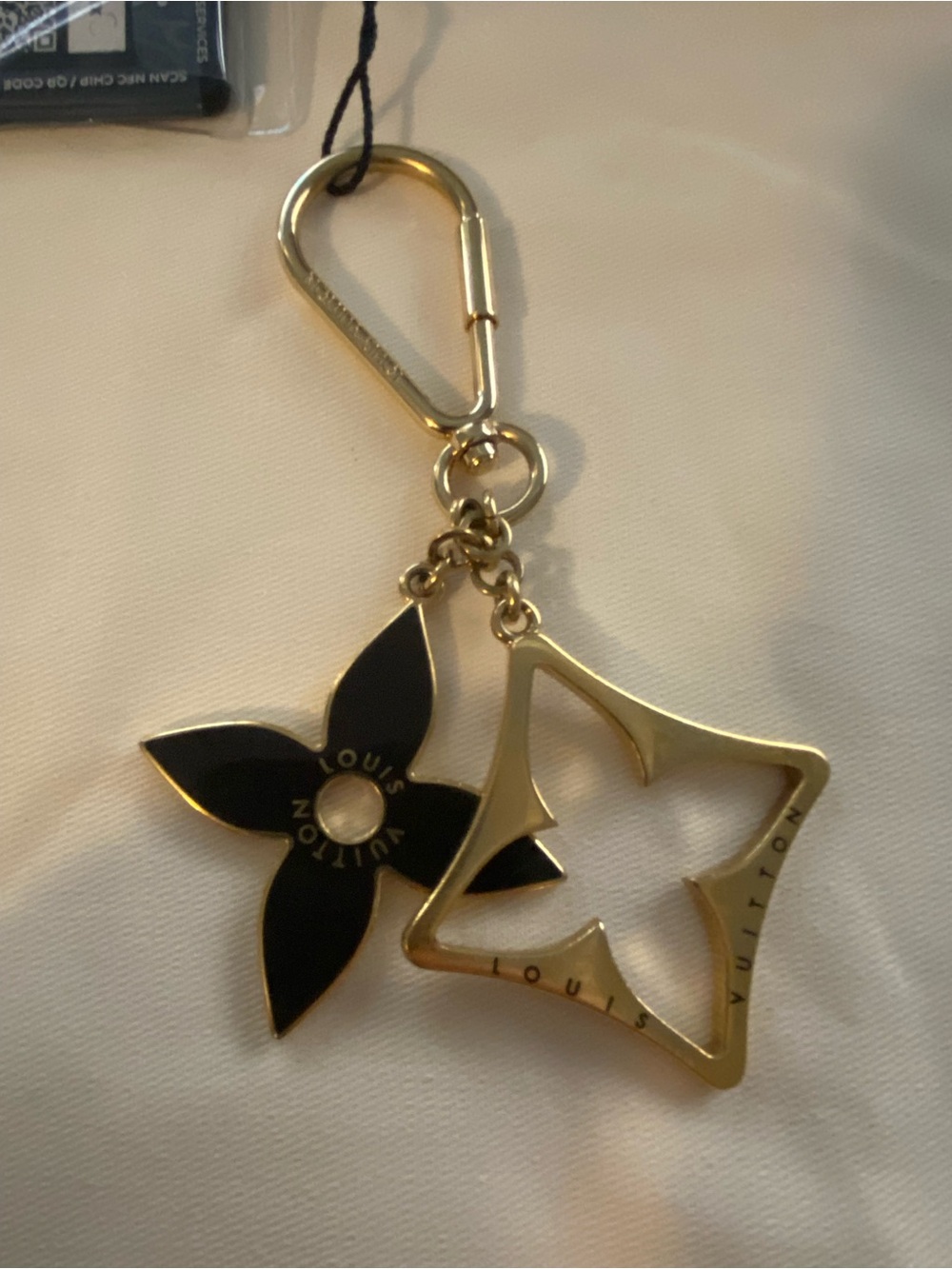 Louis Vuitton Puzzle Key Ring and Bag Charm in gold-tone and black